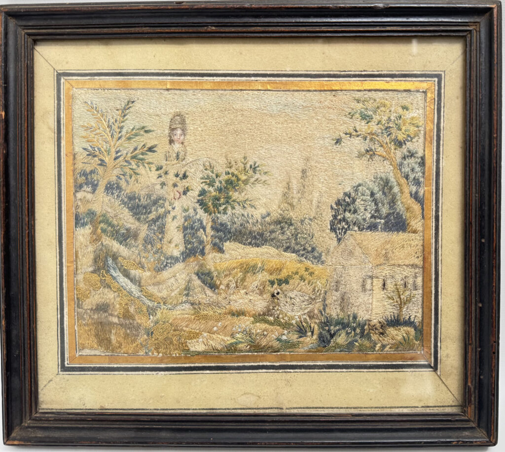 PETITE BRODERIE encadrée représentant une femme au jardin. Époque XVIIIe…