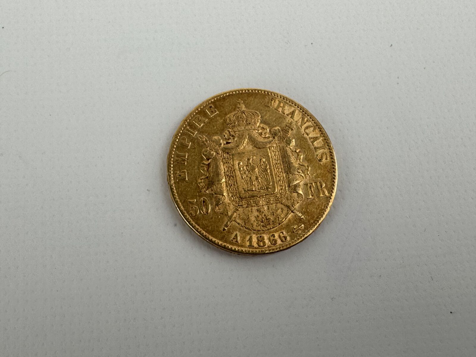 1 PIÈCE en or de 50 Francs type Napoléon III…