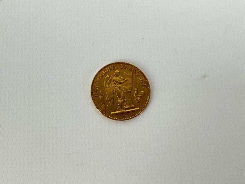 1 PIÈCE en or de Francs, type Génie, année 1877.…