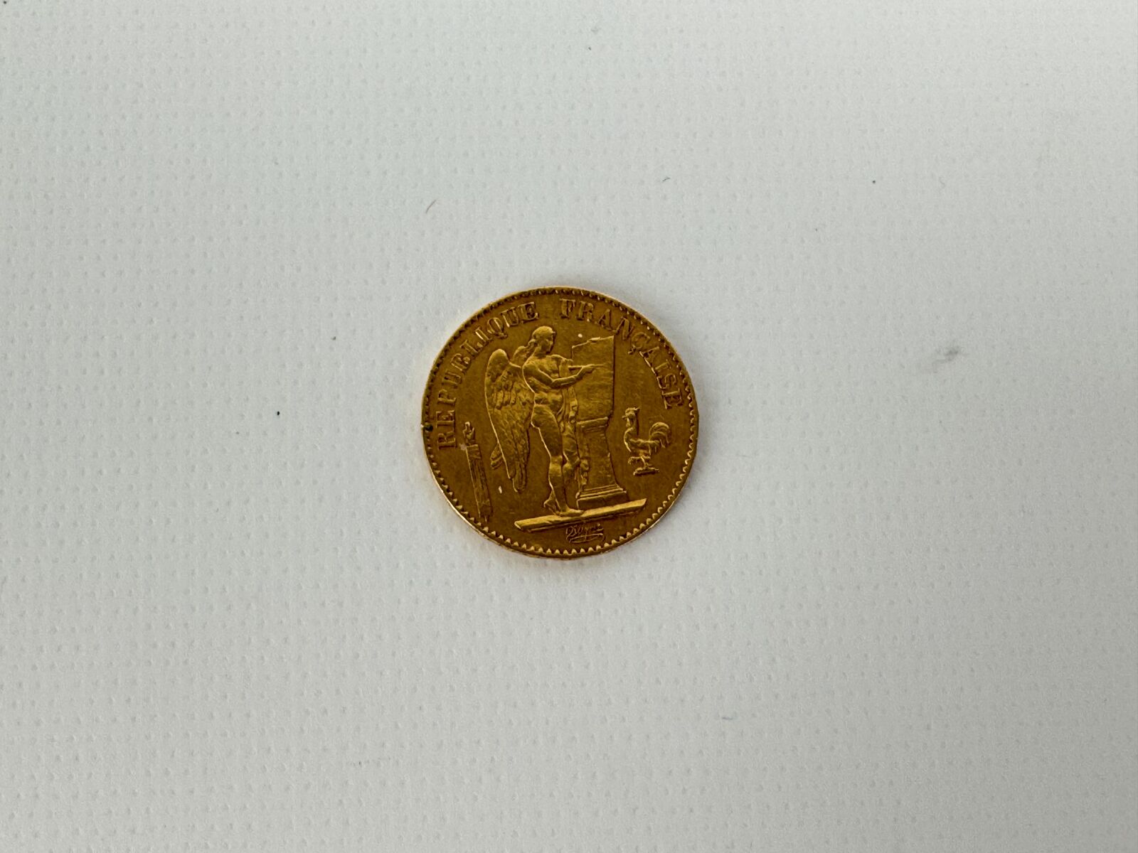 1 PIÈCE en or de Francs, type Génie, année 1877.…