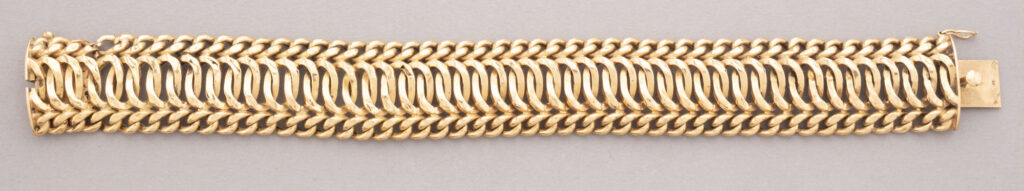 BRACELET en or rose 750 millièmes, formé de mailles plates…