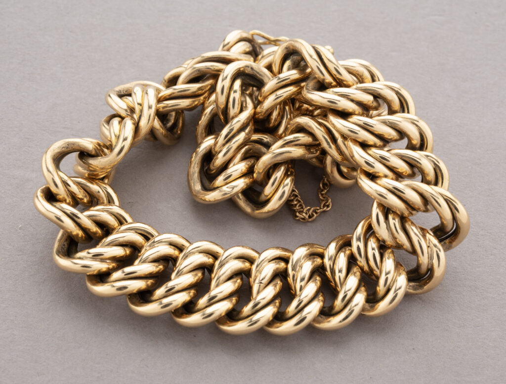 BRACELET gourmette en or rose 750 millièmes, formé de mailles…