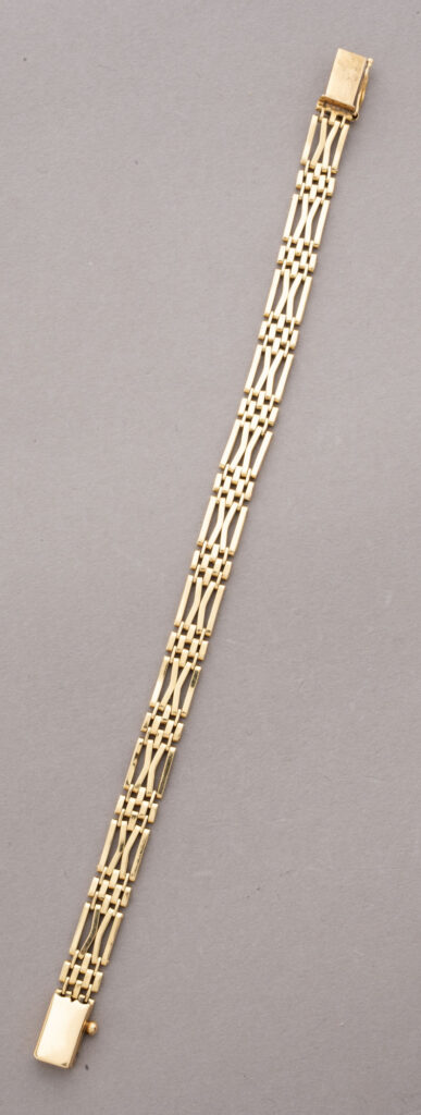 BRACELET plat articulé en or jaune 750 millièmes, fermoir cliquet…