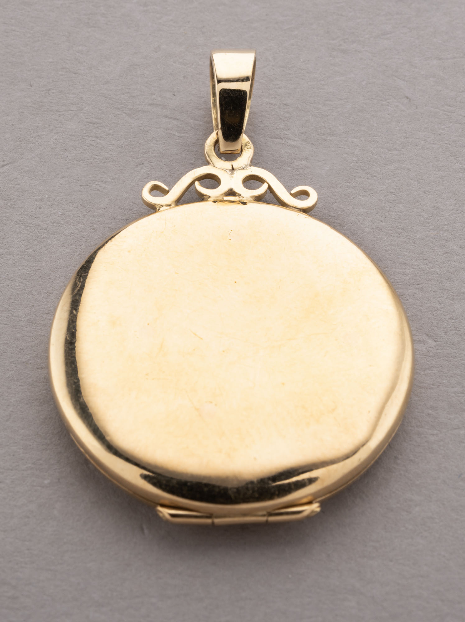 PENDENTIF porte-photo circulaire en or jaune 750 millièmes. Pds Net.…