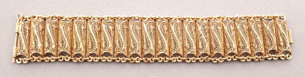 BRACELET en or rose 750 millièmes formé de côtes cylindrique…