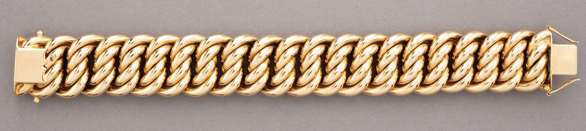 BRACELET GOURMETTE en or jaune 750 millièmes, formé de mailles…