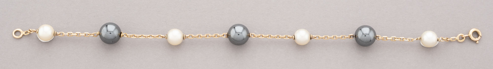 BRACELET en or jaune 750 millièmes, maille forçat avec en…