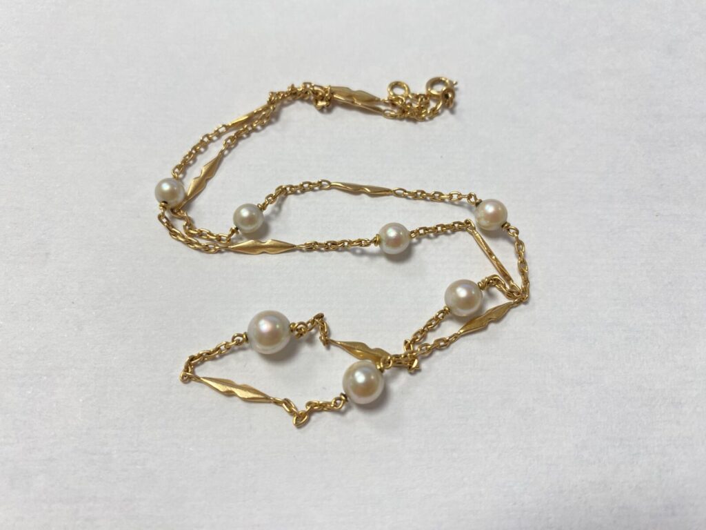 COLLIER en or rose 750 millièmes, formé de mailles forçat…