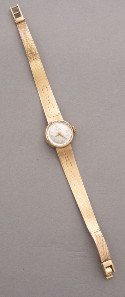 MONTRE DE DAME en rose 750 millièmes, boitier rond 16…