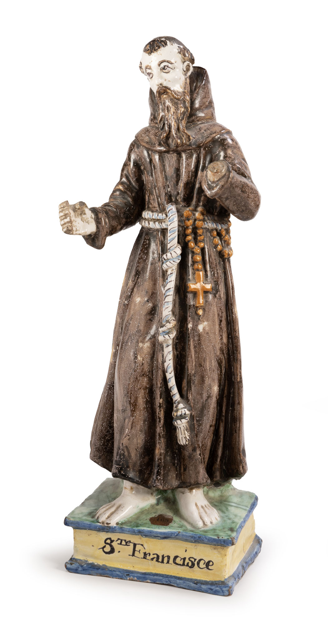 SUJET en faïence émaillée polychrome représentant saint François en robe…