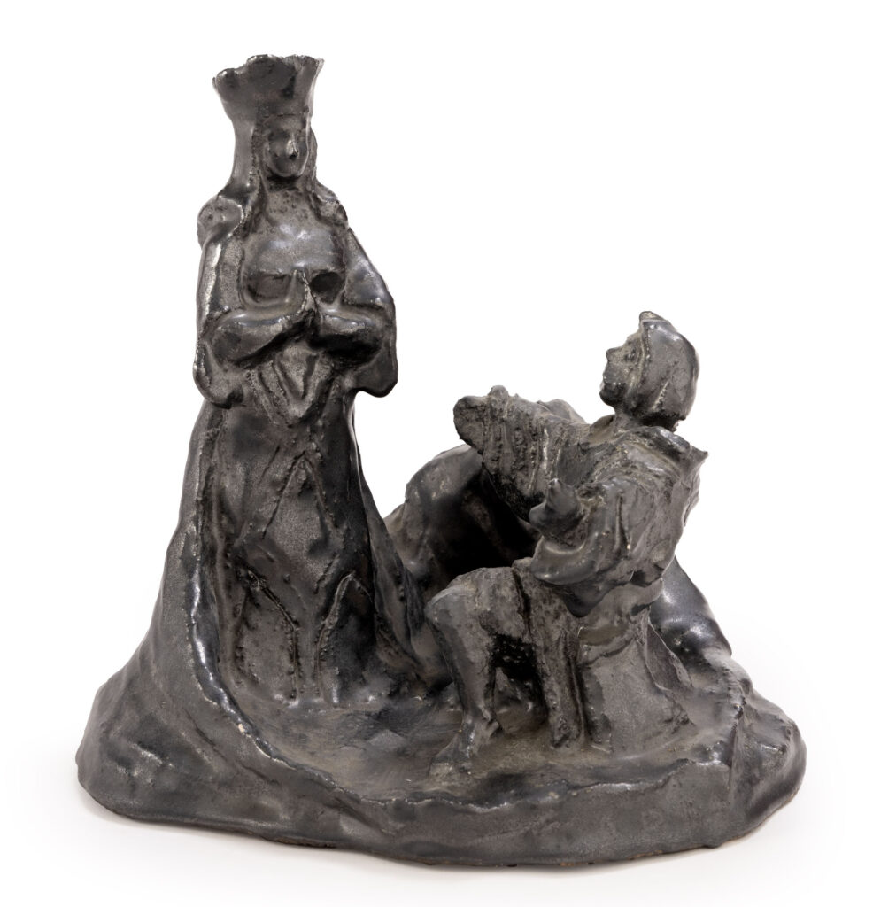 SUJET en céramique émaillée noire représentant un adorant devant la…