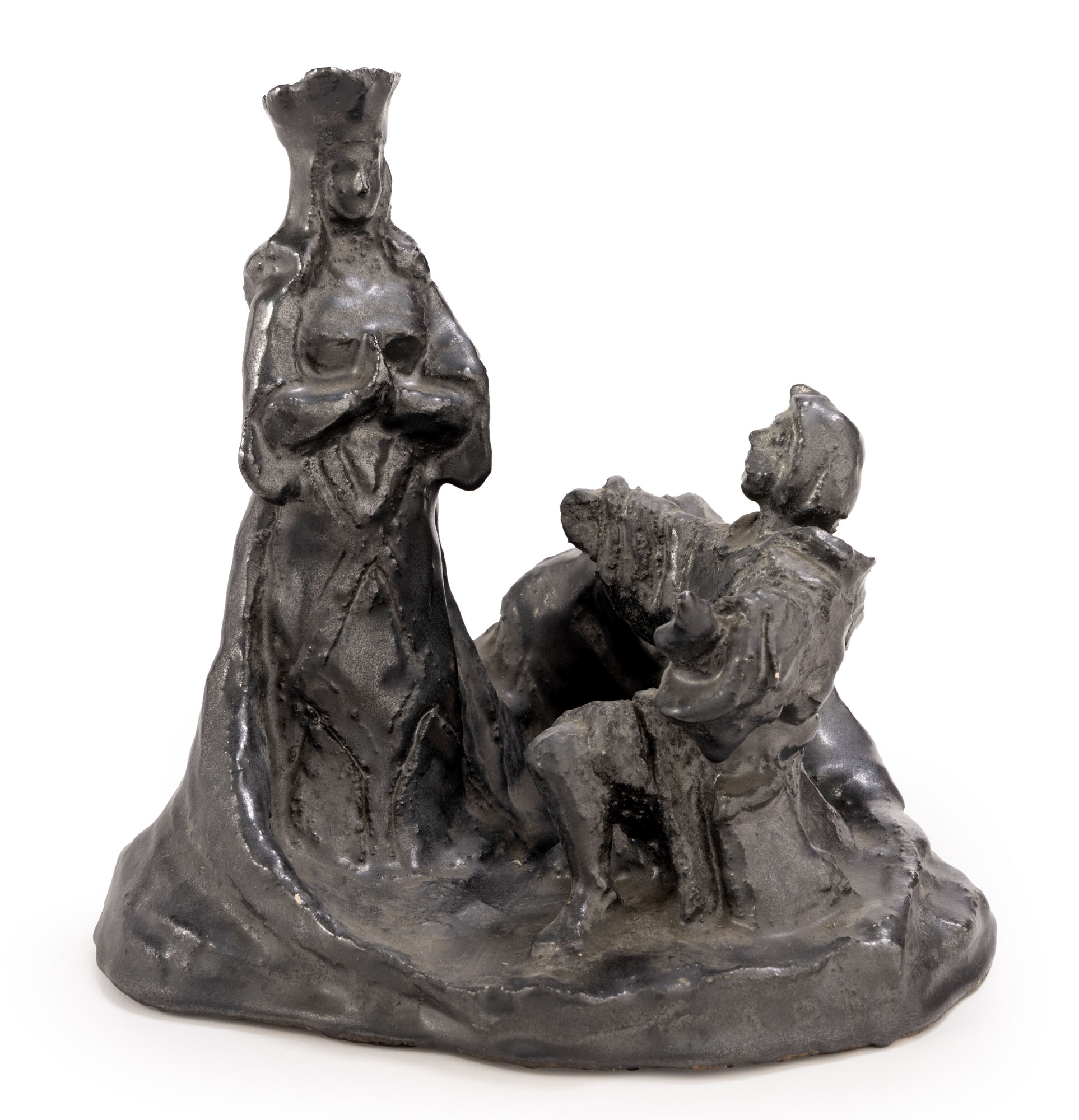 SUJET en céramique émaillée noire représentant un adorant devant la…
